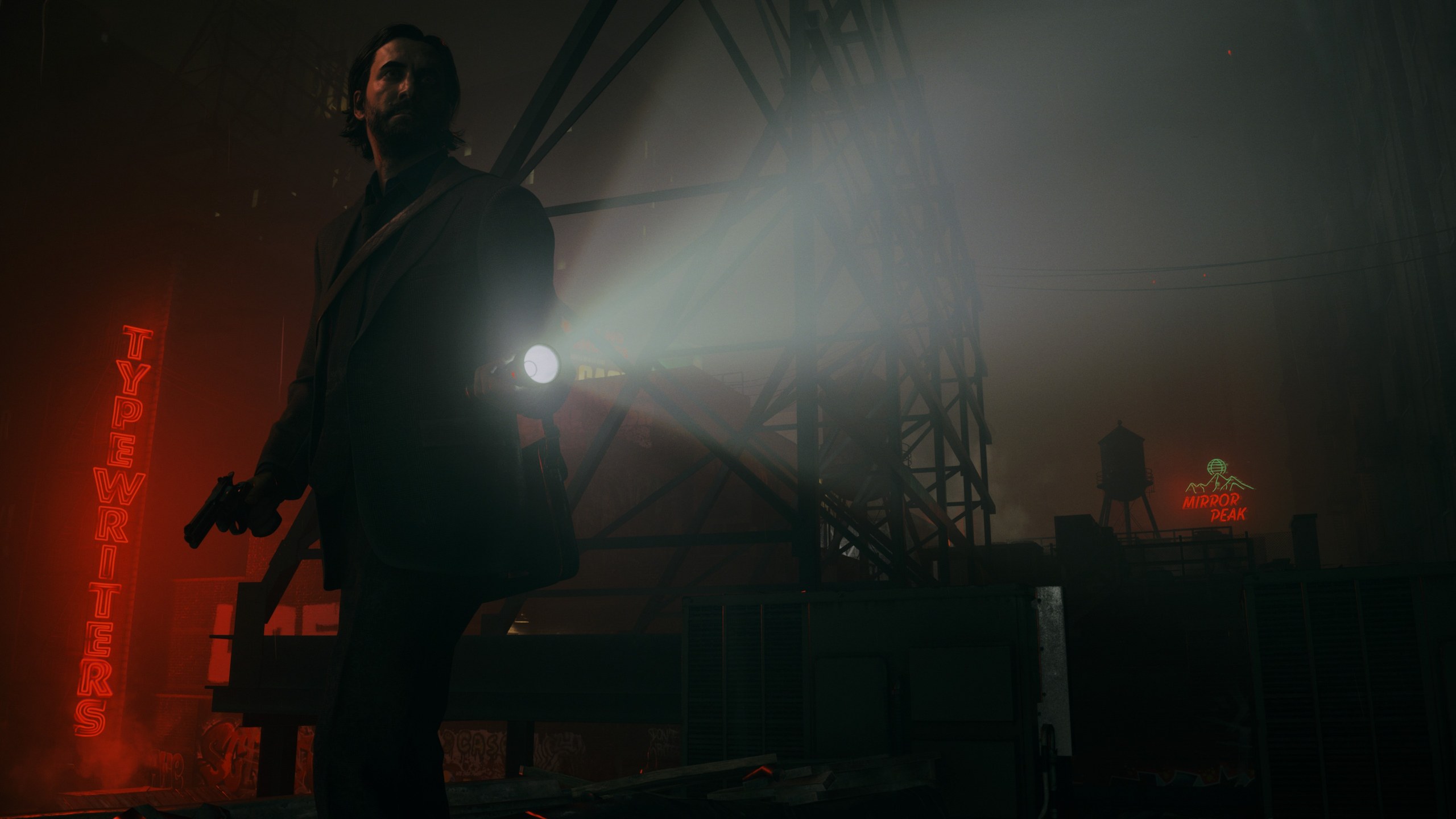 Alan Wake 2 – Alan Wake mit Taschenlampe vor rotem Neonlicht