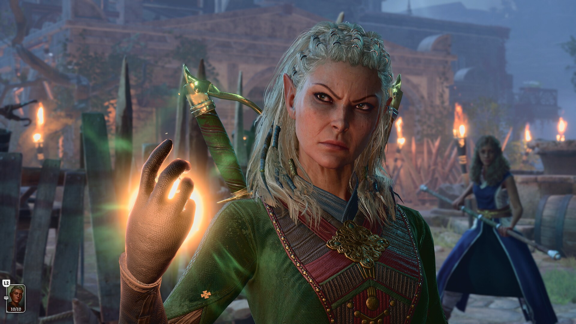 Baldur's Gate 3: Eine Elfe mit leuchtender Hand in einem nächtlichen Lager