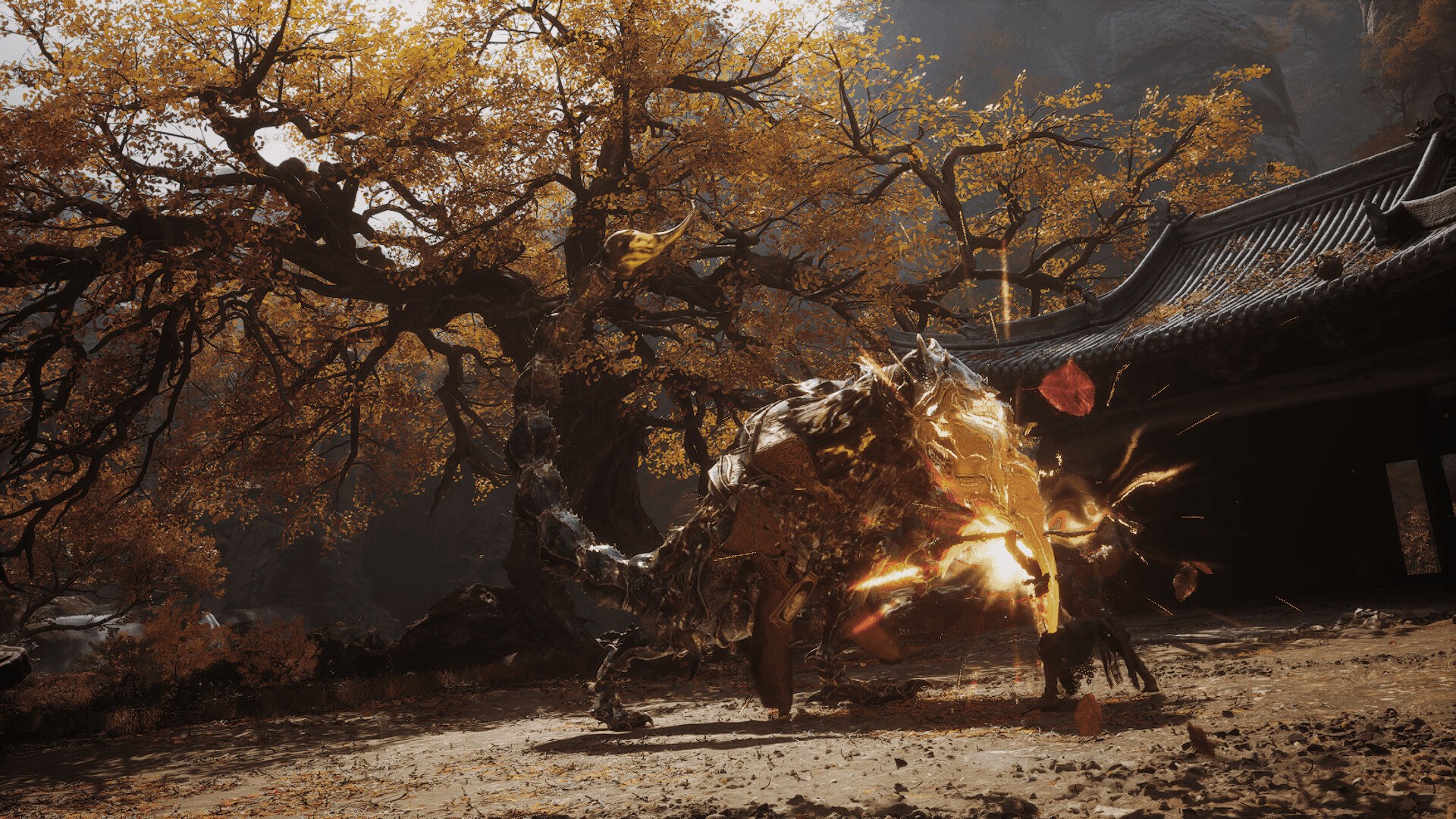 Black Myth: Wukong – Kampf unter einem herbstlichen Baum vor einem Tempel
