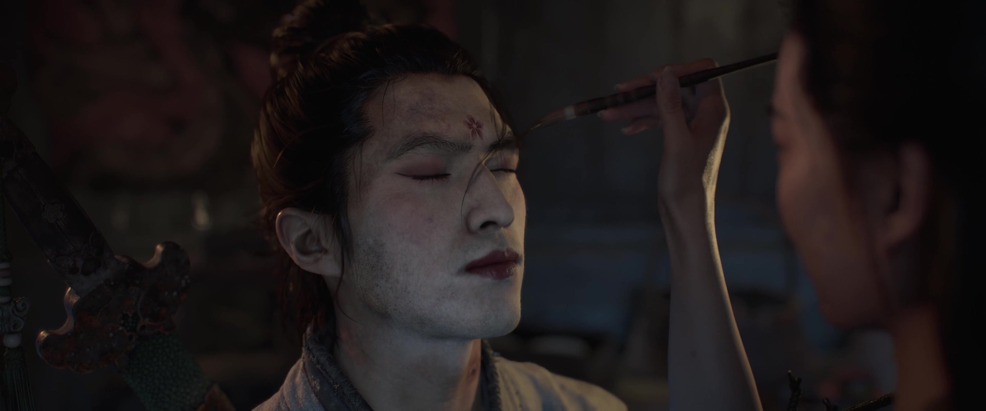 Black Myth: Zhong Kui: Der Held bekommt eine Gesichtsbemalung aufgetragen