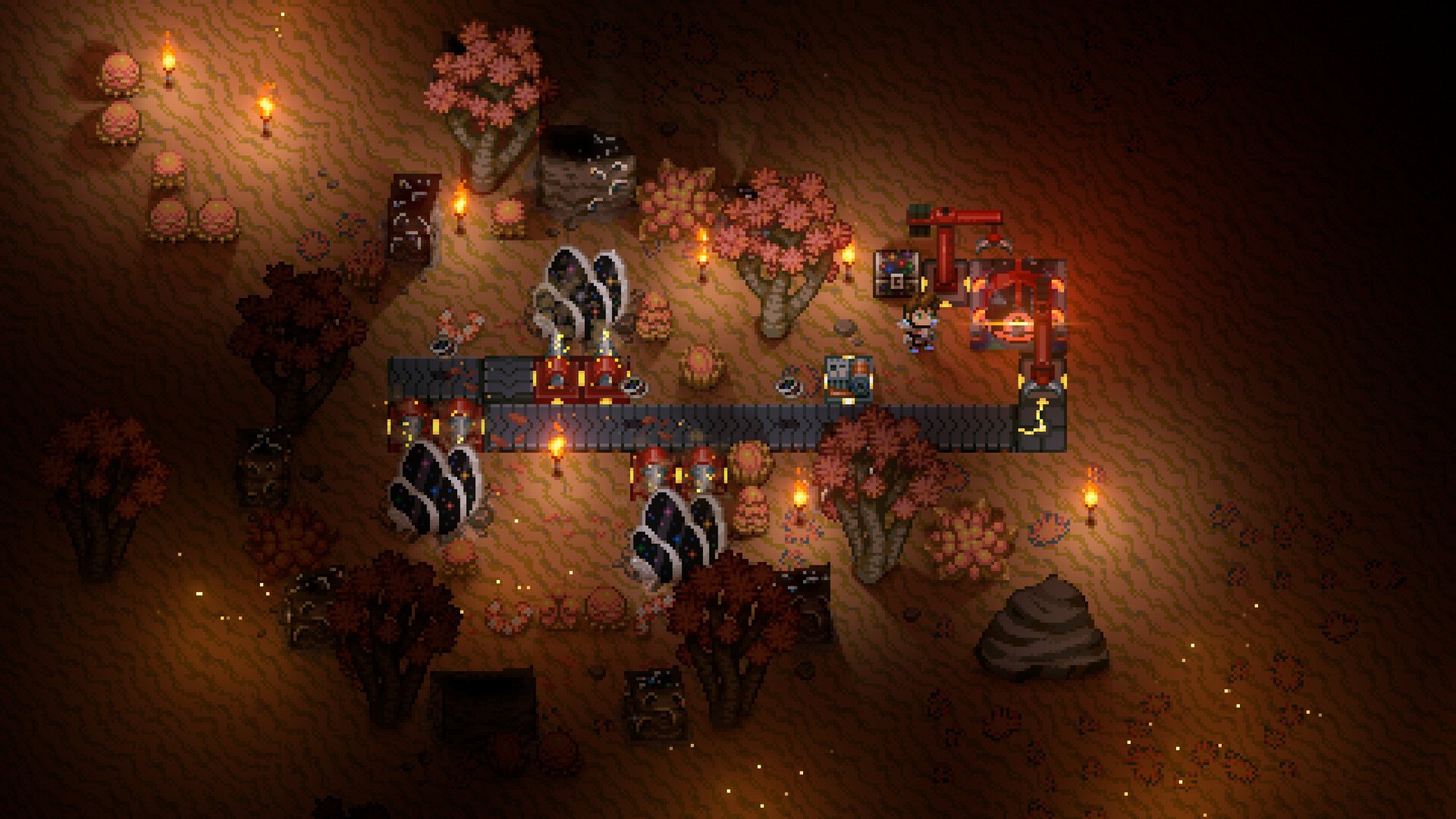 Core Keeper – Lager mit Zelten in einer rötlichen Höhle