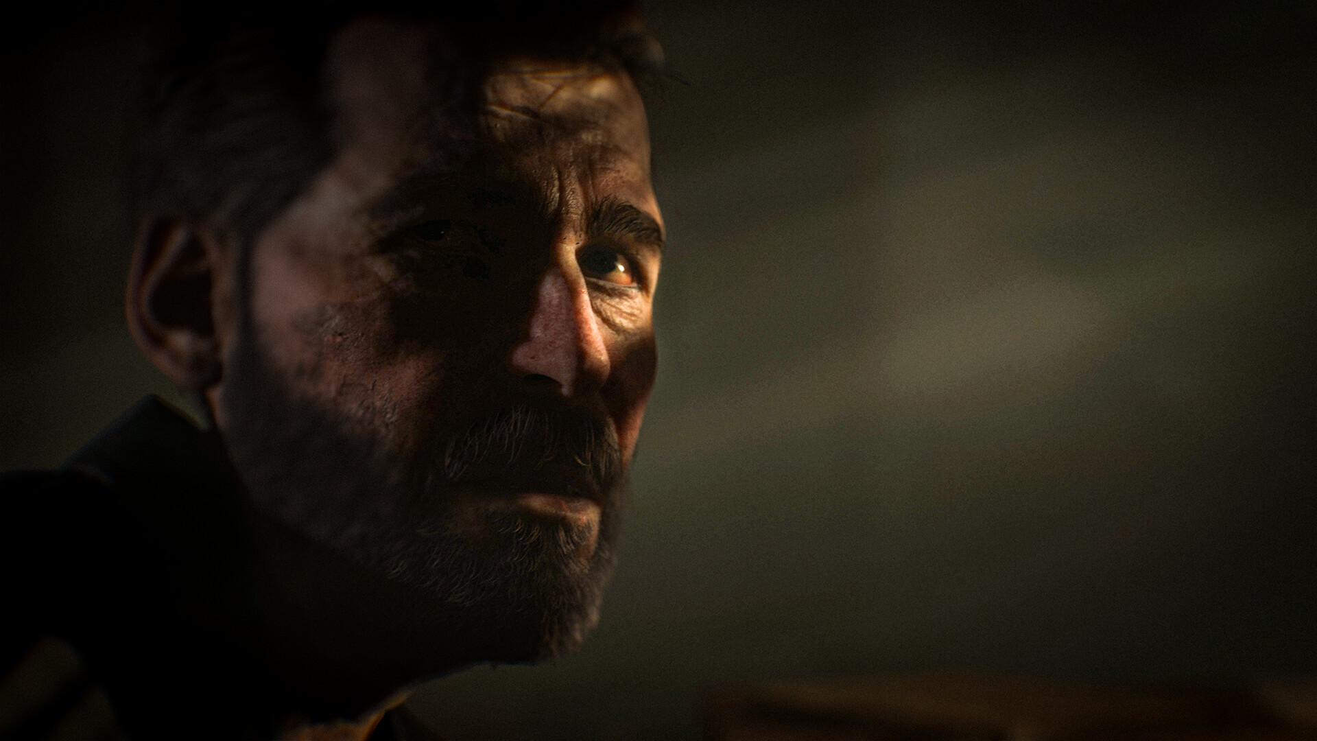 Cronos: The New Dawn – Ein Mann mit Bart in Nahaufnahme