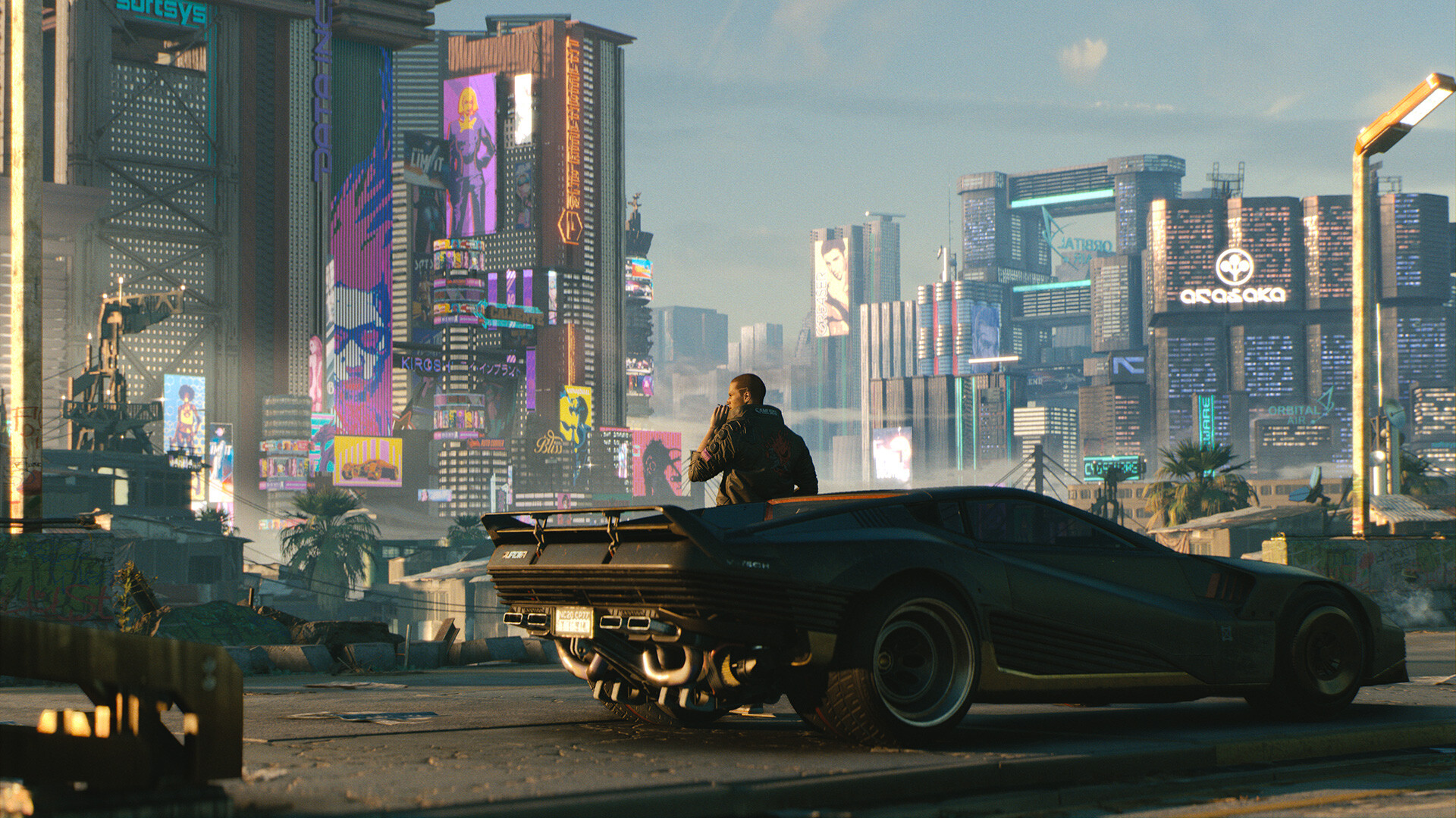 Cyberpunk 2077: Sportwagen vor der Skyline von Night City