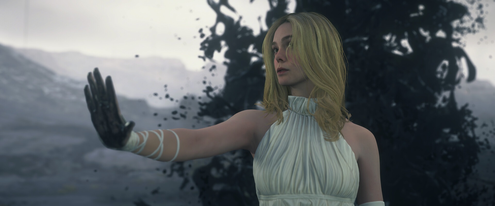 Death Stranding 2 – Elle Fanning als Fragile vor schwarzer Materie