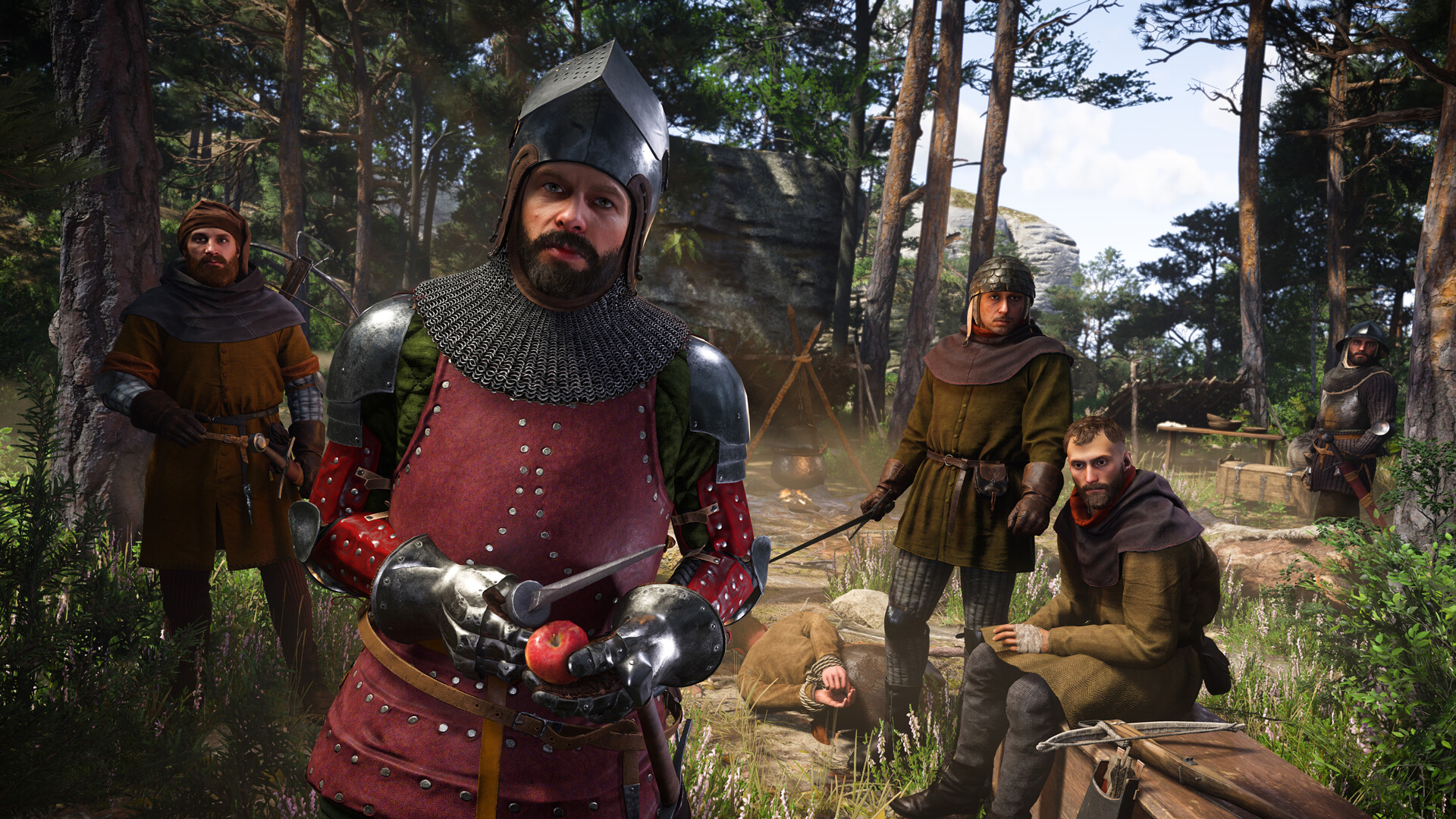 Kingdom Come: Deliverance II Screenshot: Henry steht mit Soldaten im Wald