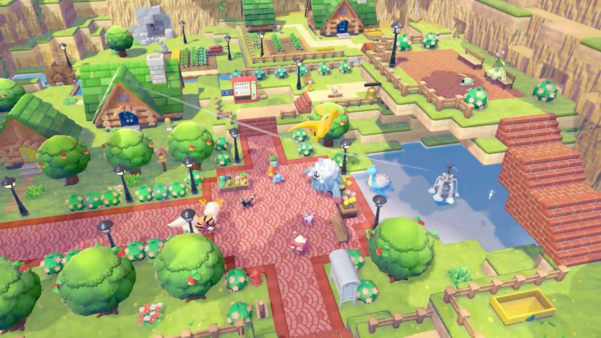 Pokémon Pokopia – Blick von oben auf eine selbst gebaute Stadt mit Feldern und Häusern