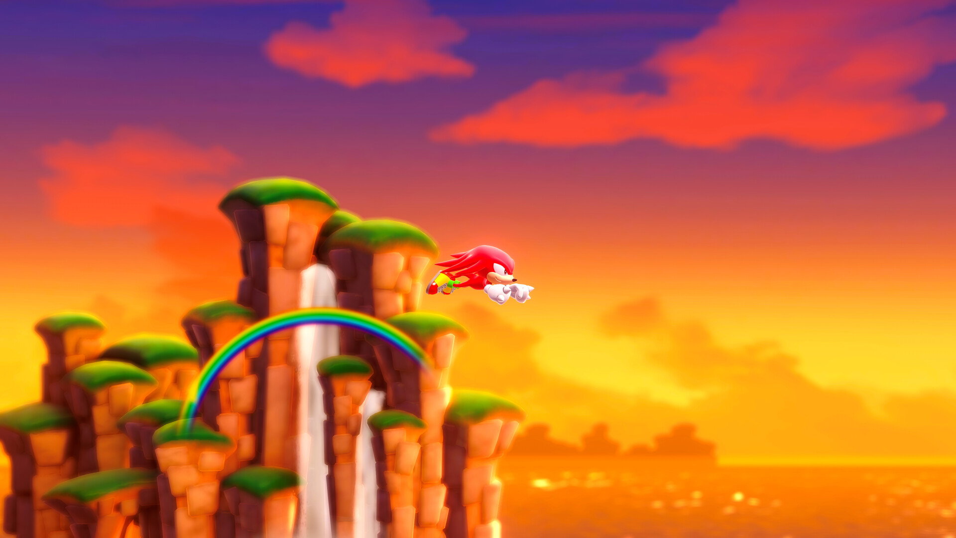 Sonic Superstars – Knuckles gleitet an einem Regenbogen-Wasserfall