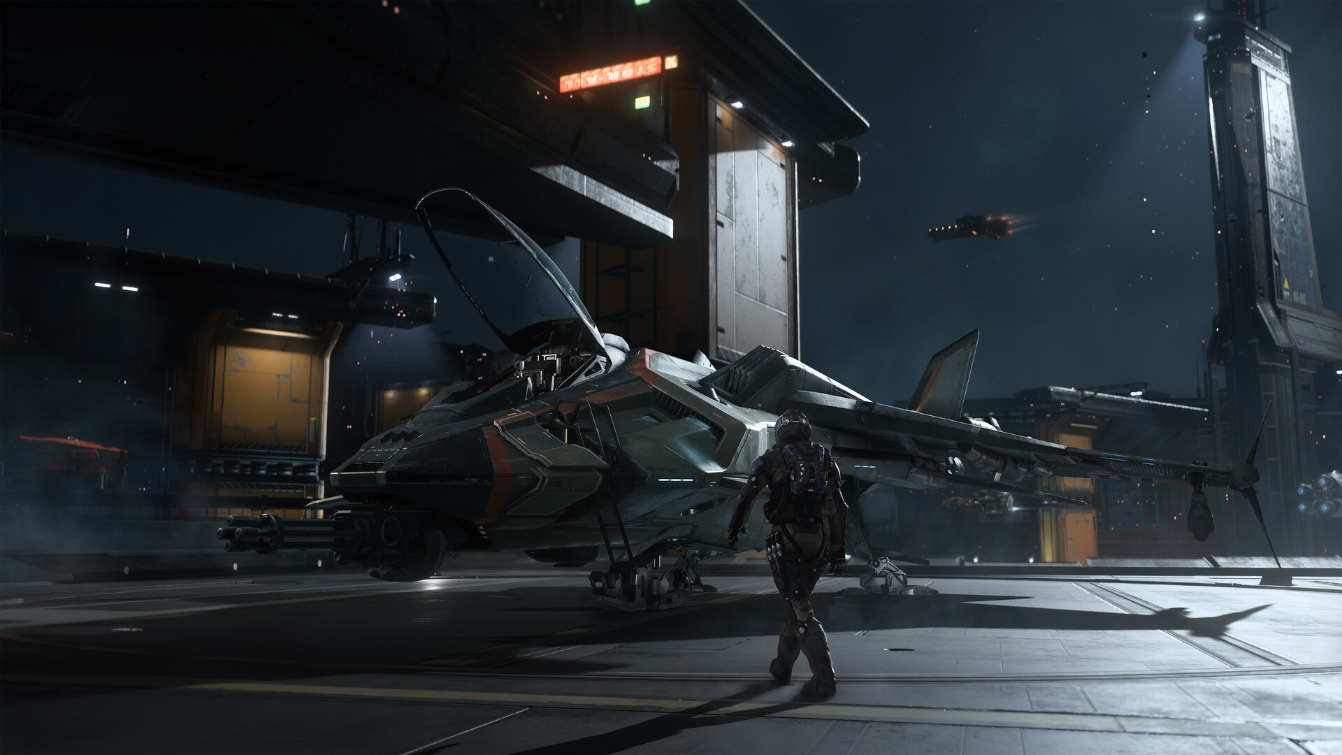 Squadron 42 – Pilot vor einem Kampfjäger im Hangar
