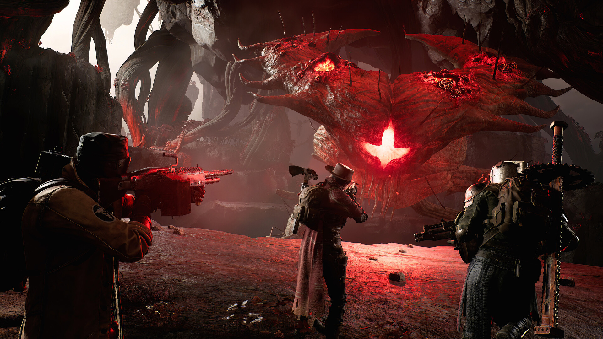 Remnant II: Zwei Spieler kämpfen gegen ein Monster mit leuchtend rotem Kern