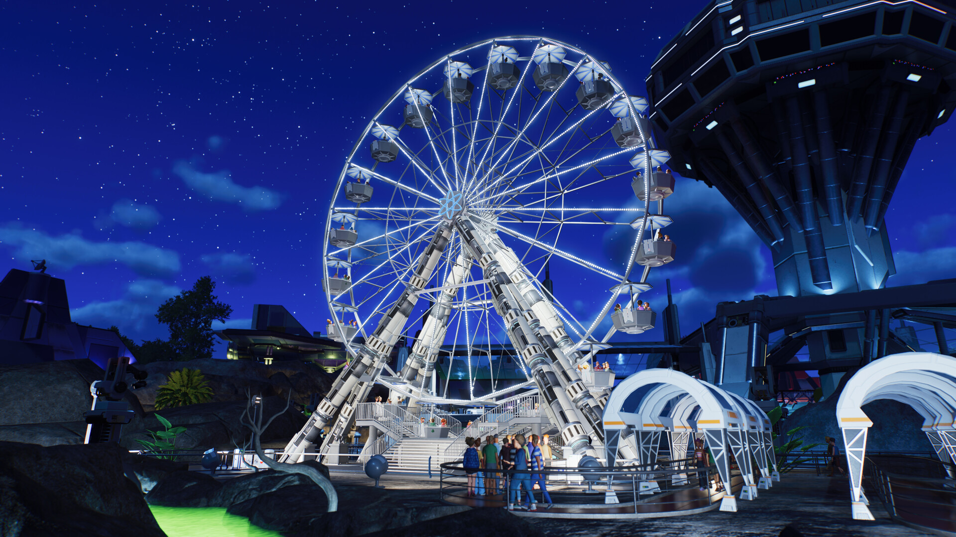 Planet Coaster 2: Ein beleuchtetes Riesenrad im Sci-Fi-Stil