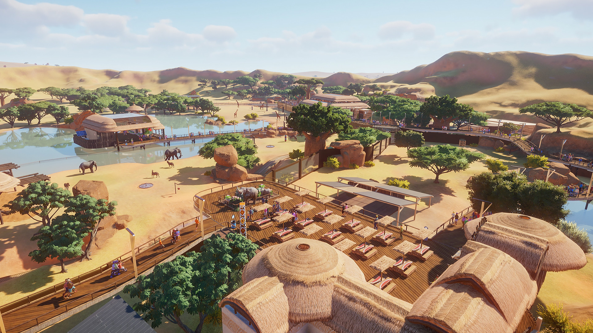 Planet Zoo: Afrikanischer Zoobereich mit Lehmhütten und Flusslandschaft
