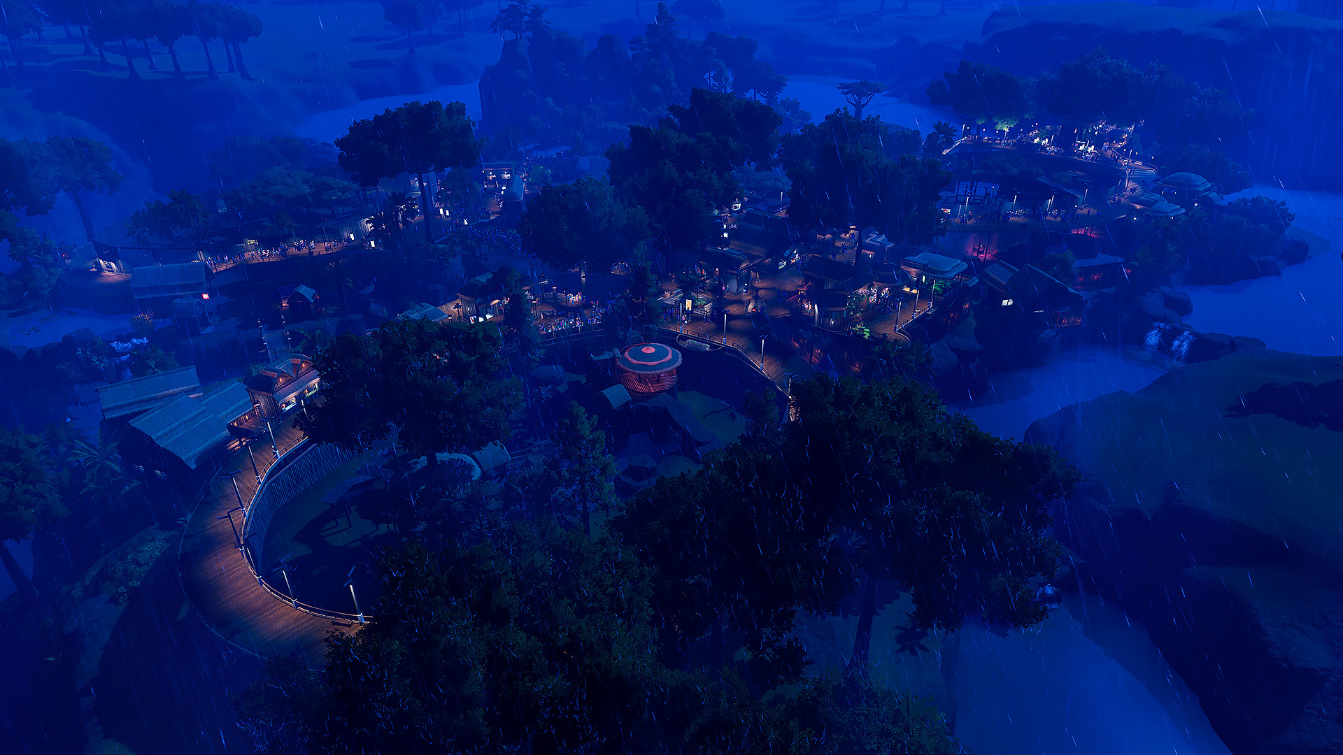 Planet Zoo: Ein Zoo bei Nacht mit beleuchteten Wegen
