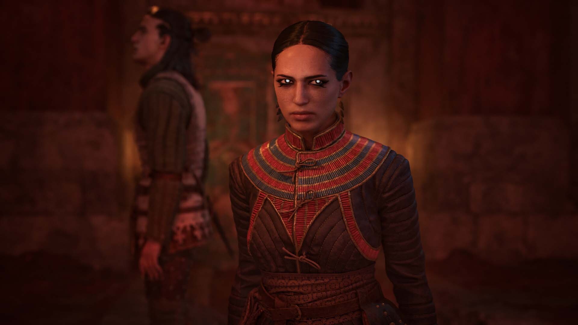 The Blood of Dawnwalker – Eine Frau mit leuchtenden Augen in einem roten Gewand