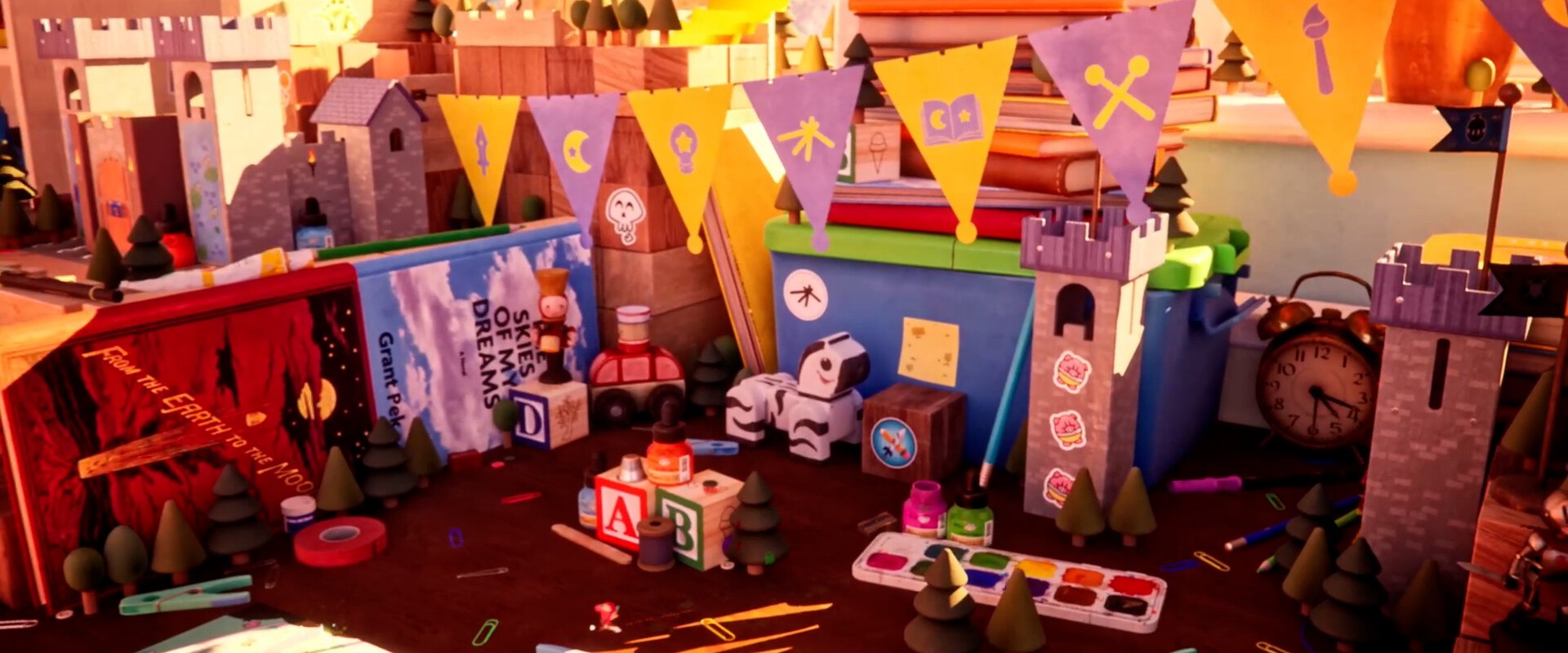 The Plucky Squire – Spielzeugburg und Bastelsachen auf einem Schreibtisch