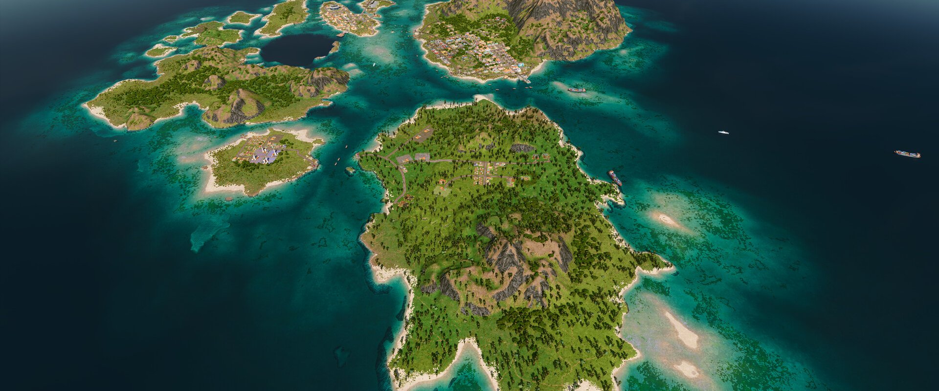 Luftaufnahme einer tropischen Inselgruppe im türkisblauen Meer