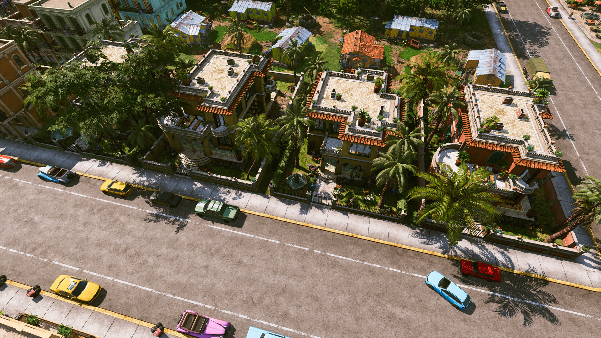 Tropico 7 Screenshot: Wohnviertel mit Palmen aus der Vogelperspektive
